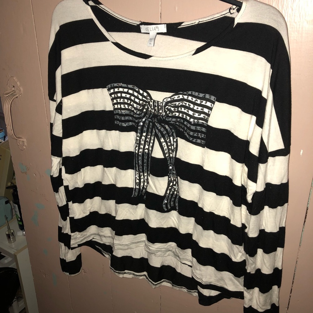 Delia’s long sleeve striped top, with BOW design